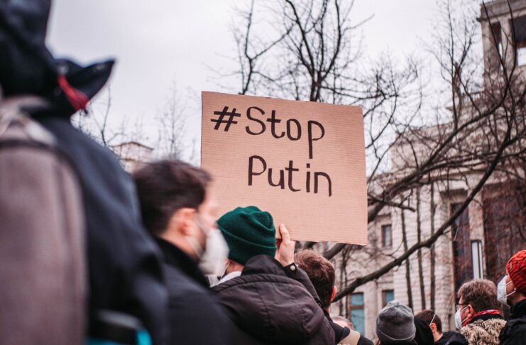 people in the street protesting against war